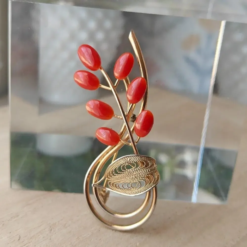 Vintage dark coral and gold tone floral spiral brooch
